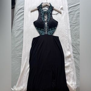 Captivating Black Gown with Alluring Details